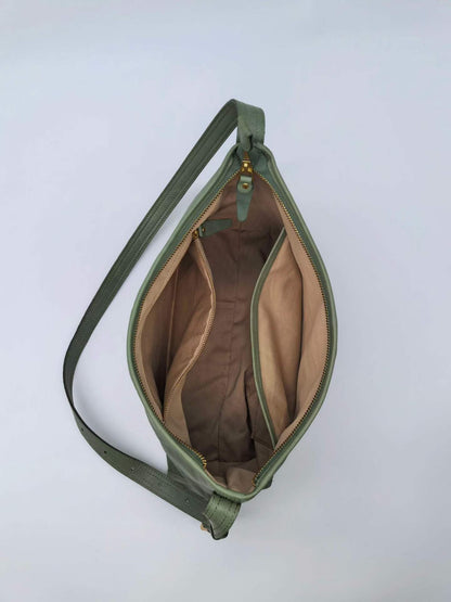 Genuine leather carryall with a spacious interior for daily belongings