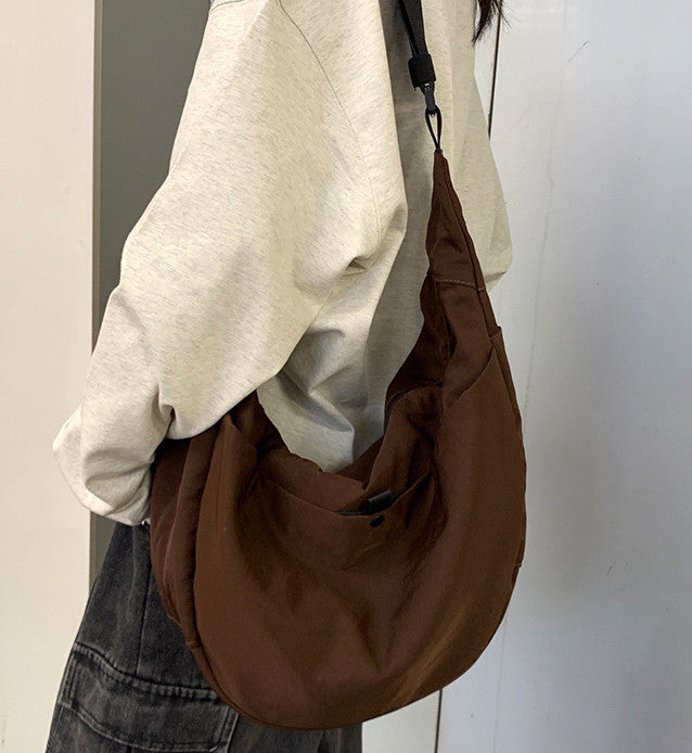 Durable daily crossbody purse for flight travel and airport transit