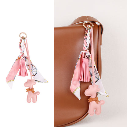 Personalizing a tote with a cute animal charm