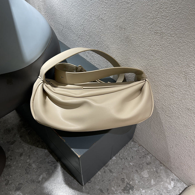 Minimalist hobo bag with flexible fabric structure for easy storage