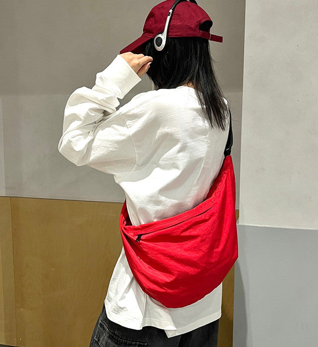 Large capacity canvas crossbody bag for women with zip closure