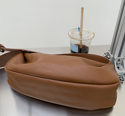 Slouchy unstructured travel purse with smooth inner lining fabric