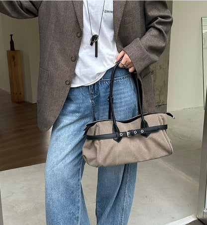 A simple fabric handbag with a modern shape