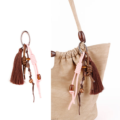 Rustic seed pod bag hanger with wooden bead accents