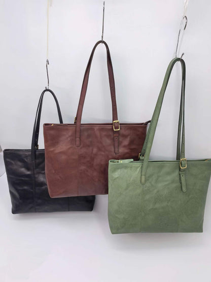 Roomy business tote with an adjustable strap for hands-free travel across town.