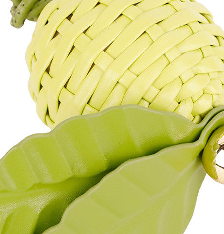 Woven botanical bag charm for a fresh everyday look