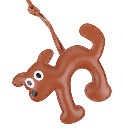 Puppy doll keyring with a woven cord detail