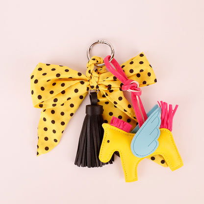Decorative yellow bow charm for handbags and totes
