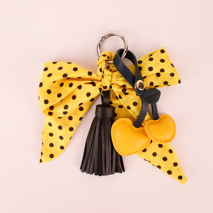 Yellow handmade accessory for bags, phones, or keys