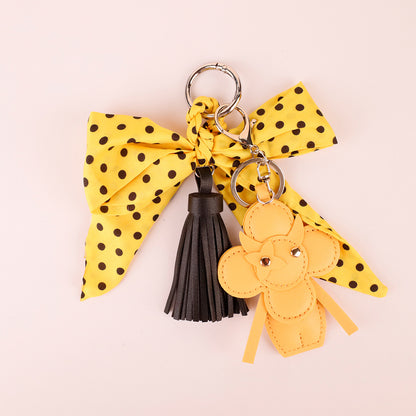 Yellow polka dot accessory for personalizing a bag