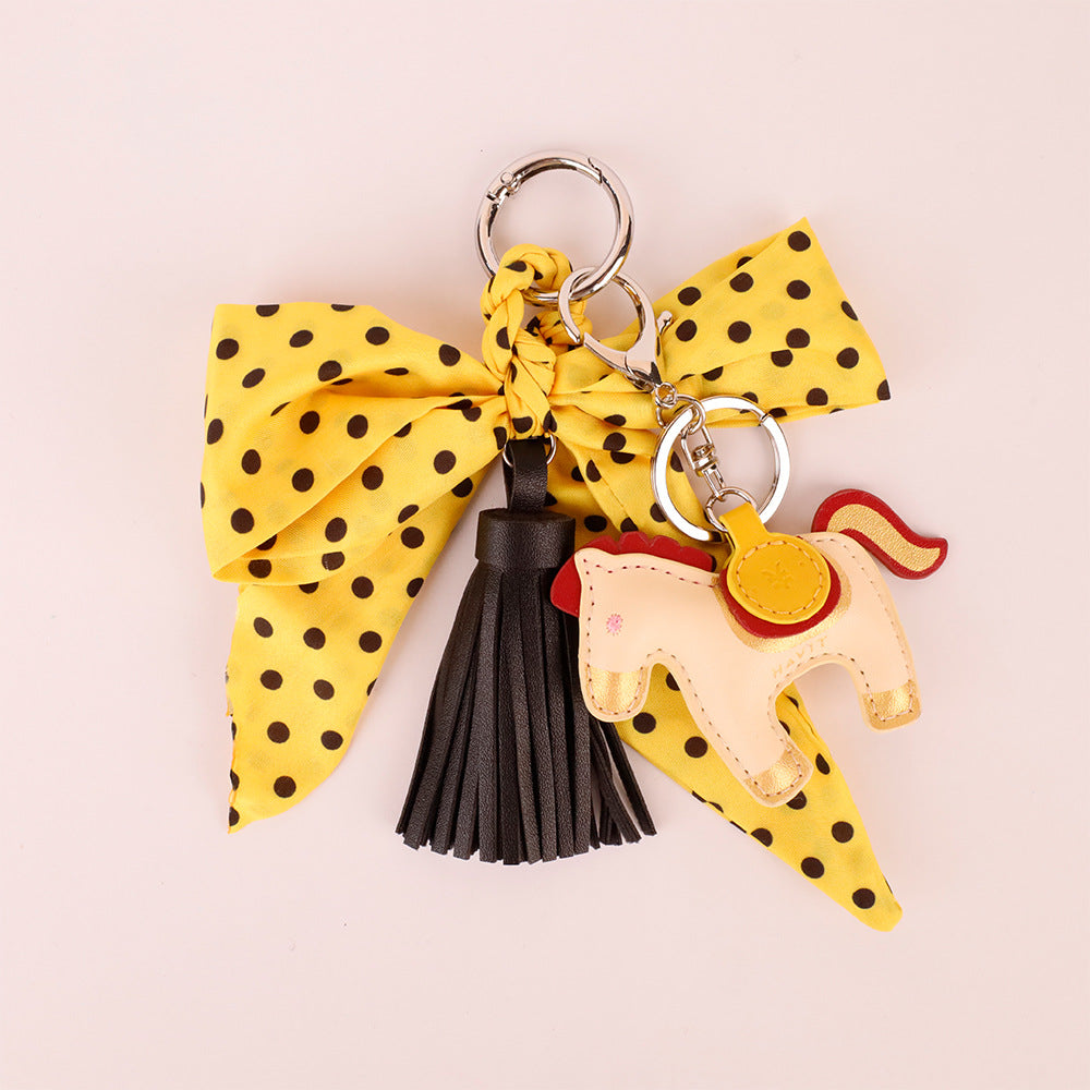 Handmade yellow bow decoration for bags and keys