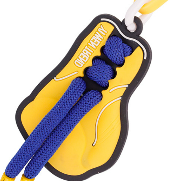 Handcrafted yellow key fob accessory showing detailed craft stitching and loop